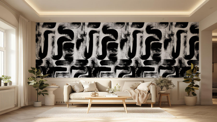 Modern living room with a cream sofa and a black and white abstract wallpaper accent wall.