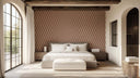 Bedroom with brown geometric wallpaper, white bedding, and exposed wooden beams.